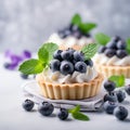 Vanilla tartlets with blueberry berries