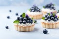 Vanilla tartlets with blueberry berries