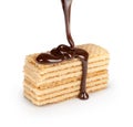 On vanilla wafer pouring chocolate