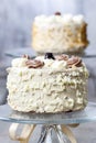 Vanilla wedding cake on cake stand Royalty Free Stock Photo