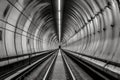 vanishing point view of a long subway tunnel