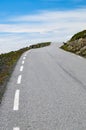 Vanishing winding desert road to heaven Royalty Free Stock Photo