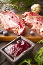 Vanison steak of wild black boar on old cutting board Royalty Free Stock Photo