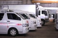 Vans and truck are in a row in garage Royalty Free Stock Photo