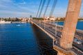 Vansu Bridge over the Daugava river surrounded by buildings in Riga, Latvia Royalty Free Stock Photo