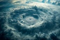 Aerial view of a giant hurricane creating spiral in the ocean. Huge storm with massive winds. Royalty Free Stock Photo