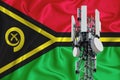 Vanuatu flag, background with space for your logo - industrial 3D illustration. 5G smart mobile phone radio network antenna base