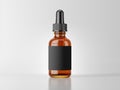 Vape bottle with liquid and blank black label on white background. 3d mockup template