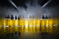 Vape concept. Smoke clouds and vape liquid bottles on dark background. Light effects.