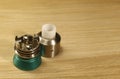 Vaping rebuildable dripping atomizer RDA on wooden surface with copy space close up