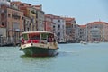 Vaporetto with passengers in Grand Canal. Venice, Italy Royalty Free Stock Photo