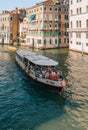 Vaporetto water bus navigating through Grand Canal in Venice, Italy Royalty Free Stock Photo