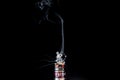 Vaporizer tank with small cloud of steam Royalty Free Stock Photo