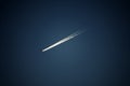 Vapour trace of aircraft in blue sky Royalty Free Stock Photo