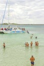 VARADERO, CUBA - JANUARY 06, 2018: People in cold water leave the damaged ship Royalty Free Stock Photo