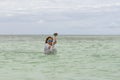 VARADERO, CUBA - JANUARY 06, 2018: A woman in cold water leaves