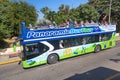 Varadero, Cuba - November, 2018: Varadero green beach tour bus in Cuba. Red and green panoramic buses for tourists ride around the