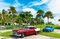 American Oldsmobile and a Buick vintage car parked in near the beach in Varadero Cuba - Serie Cuba Reportage Royalty Free Stock Photo