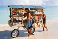 Chef prepares a giant seafood paella on beach Varadero near sunbathing tourists