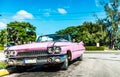 HDR - American pink convertible vintage car in the front view in Varadero Cuba - Serie Cuba