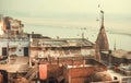 Varanasi city rooftop view with old buildings near Ganges river and grunge historical roofs, India Royalty Free Stock Photo