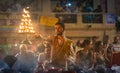 Varanasi Ganga aarti ceremony ritual performed by a young priest with sacred fire