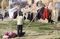 Varanasi ghats people washing clothes on the street on the banks of the river Ganges