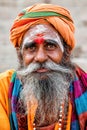 Old saddhu religious ascetic and holy person in Hinduism and Jainism on the ghats of Varanasi