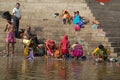 VARANASI, INDIA - December 26, 2014: Laundry in holy Ganges river, Varanasi, India