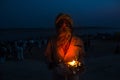 VARANASI, INDIA - February 14, 2016 : Unidentified Hindu priests perform the fire ritual during religious Ganga Aarti festival