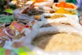 Varanasi, India, Mar 10 2019 - Colorful curry a pepper spices powders and herbs in traditional street spice market in