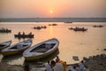 Pilgrims on boat floating on the waters of sacred river Ganges early morning. Royalty Free Stock Photo