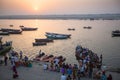 Pilgrims on boat floating on the waters of sacred river Ganges early morning. Royalty Free Stock Photo