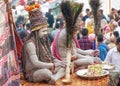 Naga Sadhu on the banks of the Ganges in Varanasi Royalty Free Stock Photo