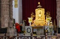 Varanasi, India: Golden statue of sitting Buddha in meditation at the Buddhist temple Mulagandhakuti vihara, Royalty Free Stock Photo