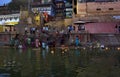 Varanasi, India: Hindu Family and friends take an early morning dip in the Ganges at Varanasi to pray and wash