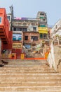 VARANASI, INDIA - OCTOBER 25, 2016: View of Narad Ghat riverfront steps leading to the banks of the River Ganges in