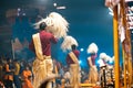 17.12.2019, Varanasi, India. The sacred religious ceremony of Arati. View of a row of men with ritual brooms in their hands. Night