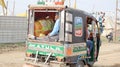 Back side of an Auto-rickshaw used as a mode of transportation in Indian cities.