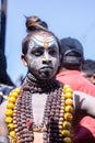 Male artist act as lord shiva with painted face during masaan holi in varanasi