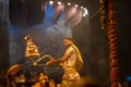 Portrait of hindu male priest performing ganga aarti in varanasi