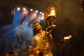 Portrait of hindu male priest performing ganga aarti in varanasi