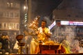 Priest performing ganga aarti at dasaswamedh ghat in varanasi