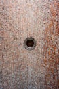 Hole in a curved inner stone roof of a medieval building..