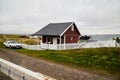 Varde, Norway - June 23, 2019: Calm landscape with water and fishing village on the bank of a beautiful fjord in a morning, Norway Royalty Free Stock Photo