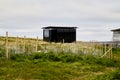 Vardo, Norway - 23 June 2019: Black kube building which is memorial devoted to memory innocently killed during witch hunting. Royalty Free Stock Photo