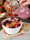 Vareniki with cherries and berry sauce