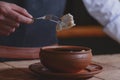 Vareniki dumplings, traditional Ukrainian food served in a ceramic bowl in a restaurant.