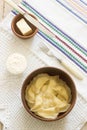 Varenyky, vareniki, pierogi, pyrohy or dumplings served with sour cream and butter. Royalty Free Stock Photo