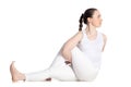 Variation of Ardha Matsyendrasana yoga pose Royalty Free Stock Photo